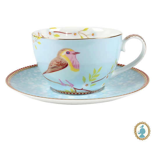 Xícara de Chá e Pires Early Bird Blue (280ml) da Pip Studio, destacando o pássaro no centro e o fundo azul.
